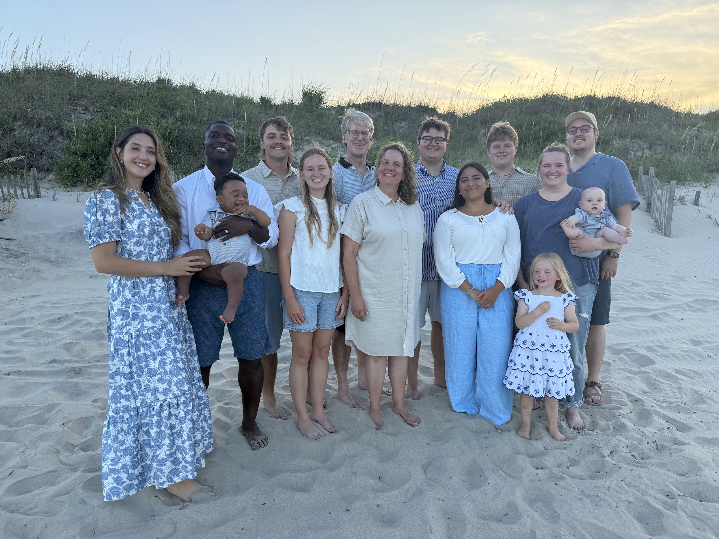 Family beach portrait with warm evening tones