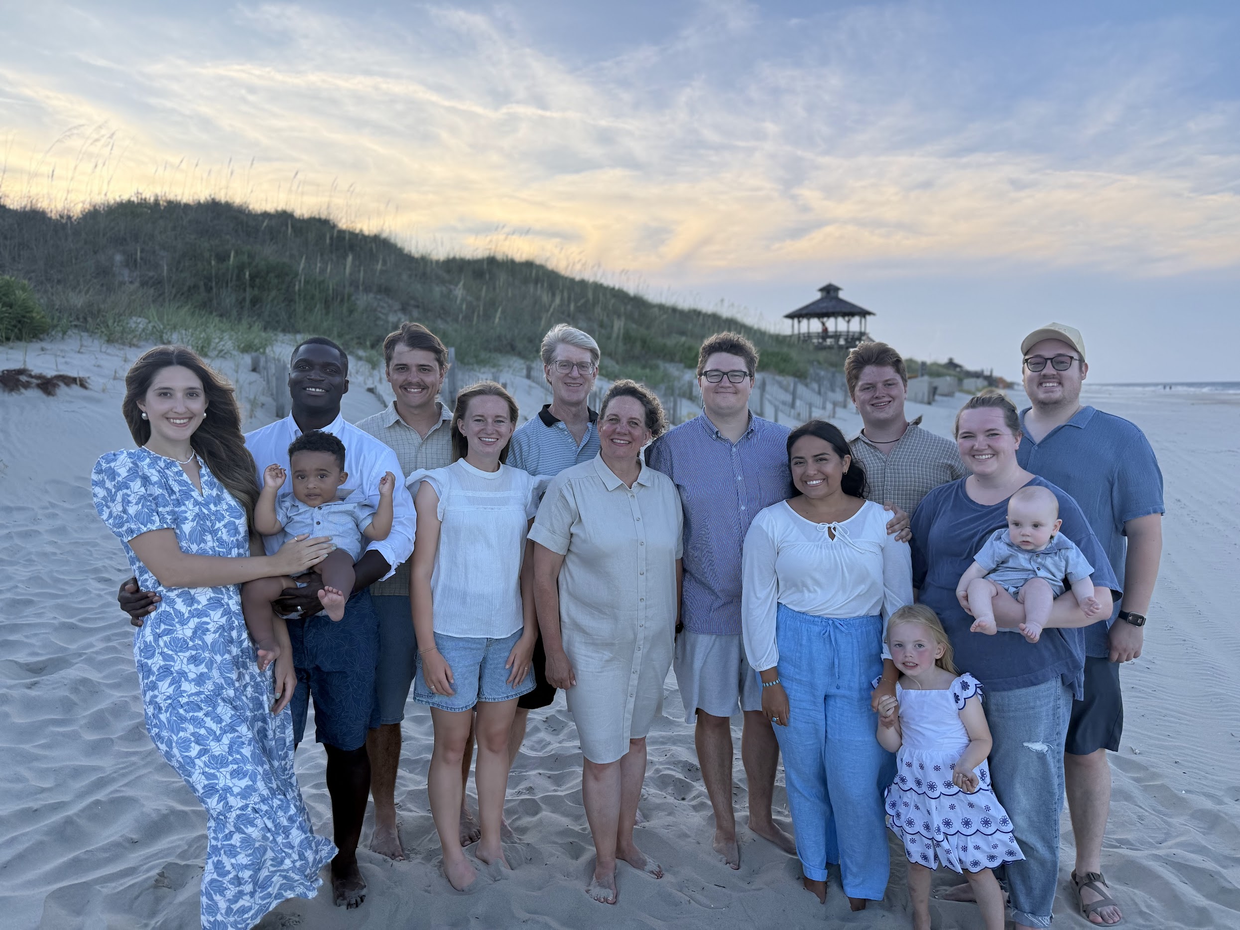 Family portrait on the beach at sunset